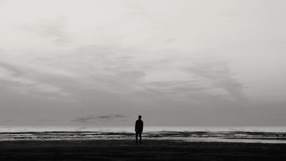 Man standing at ocean