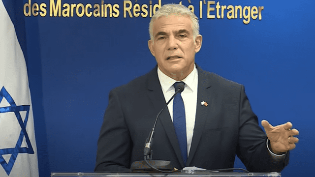 Israel Foreign Minister Yair Lapid talking in Morocco