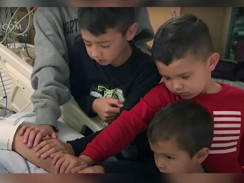 Grandchildren prays for pastor grandfather