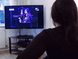 Divorced woman Watching The Soul Survivor on God TV